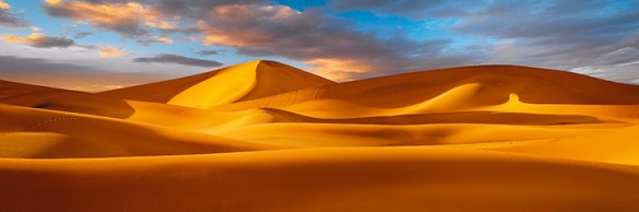 Drifiting Shadows by Peter Lik.  My spellchecker unkindly offered YUK as a suggestion for the name of the photographer.