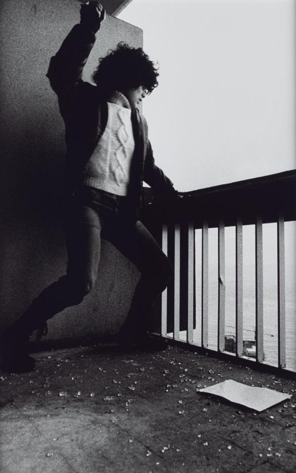 A Young Lebanese Christian Woman Throwing a Hand Grenade from the Holiday Inn Hotel 1976, printed 2013 by Don McCullin born 1935